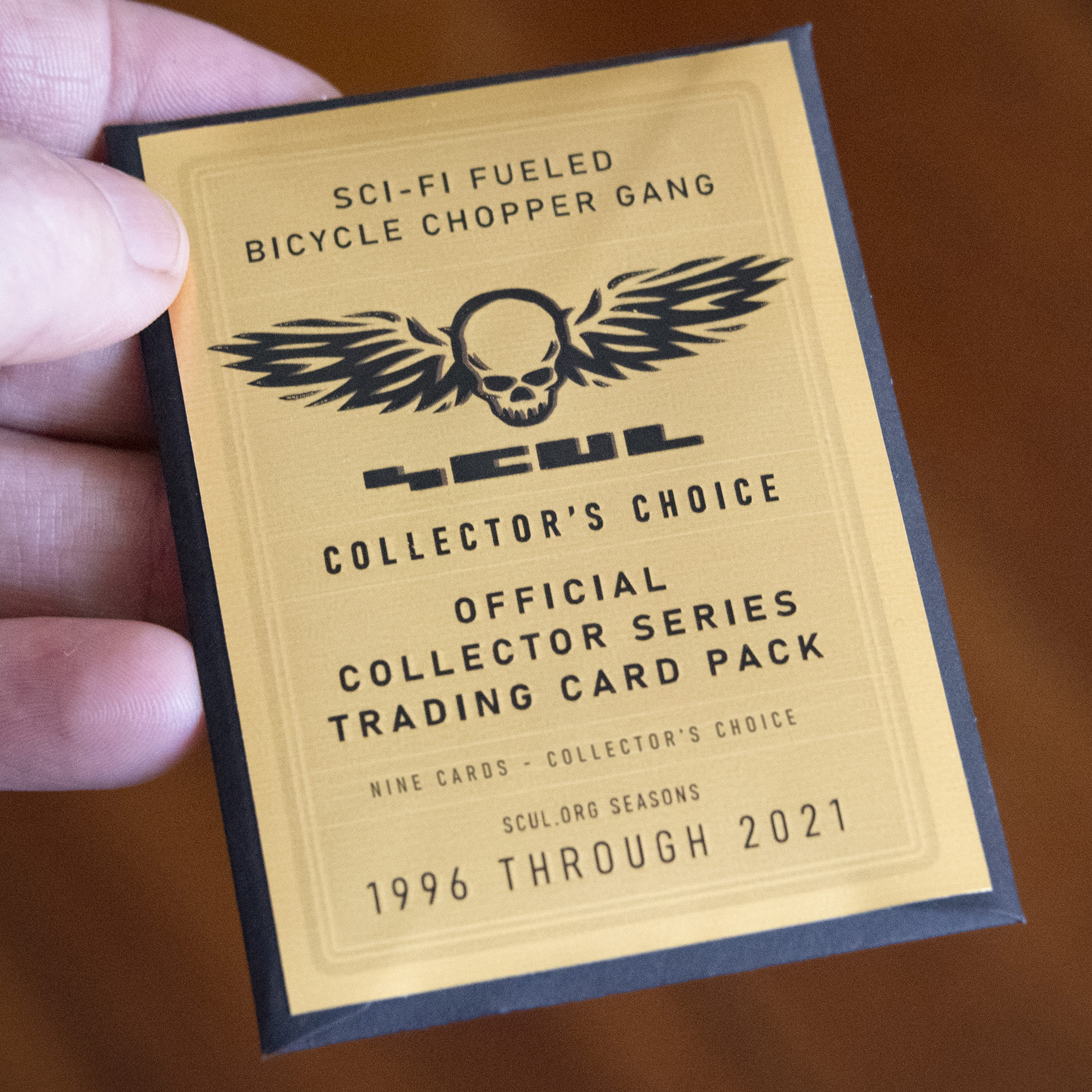 Trading Cards pack in hand